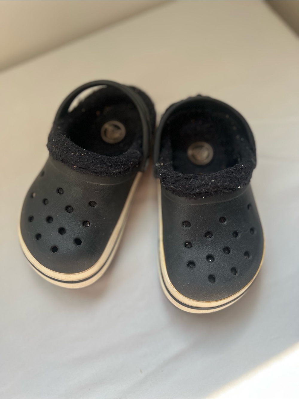 CROCS Kids Black Fleece-Lined Clogs with White Trim